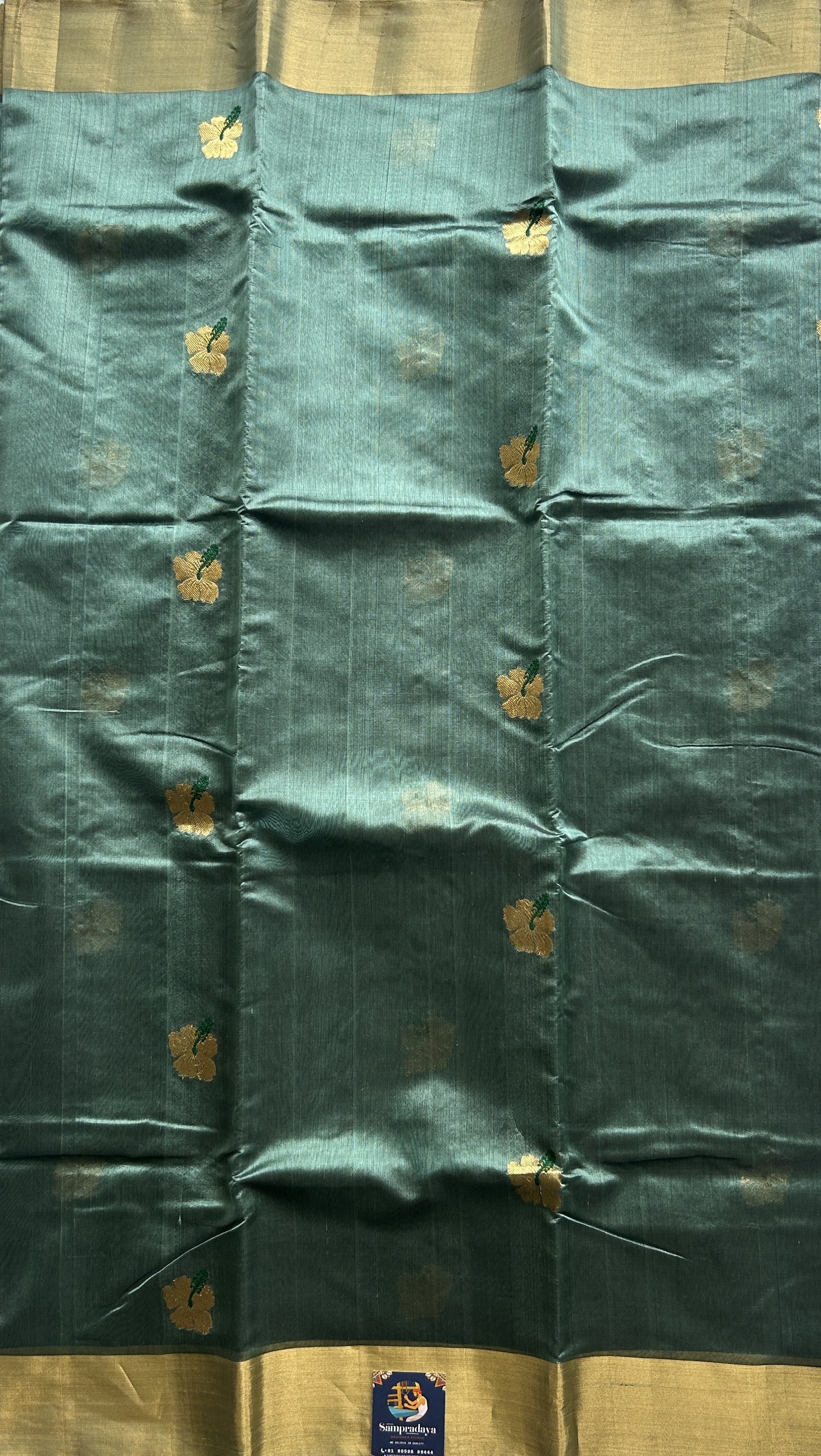 Chanderi Silk Saree Greyish Green color Elegantly Paired with a Gold Zari border - Sampradaya Designer Studio