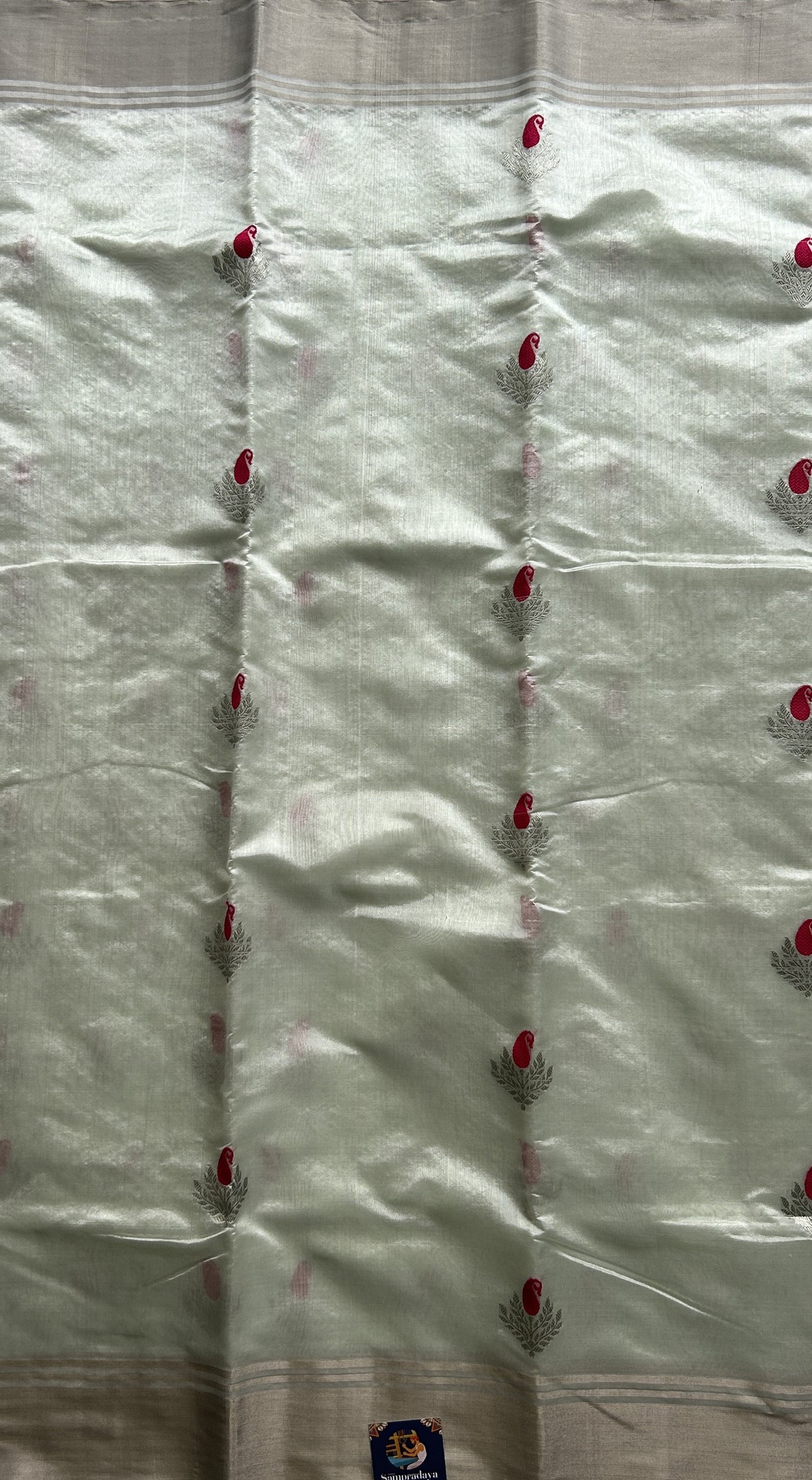 Chanderi Silk Saree Pastel Green color Elegantly Paired with a Gold Zari border - Sampradaya Designer Studio