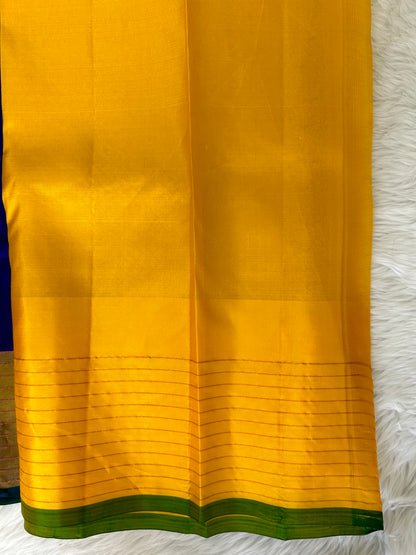 Gadwal Pattu Saree Dark Royal Blue colored saree complemented with a Yellow checks border - Sampradaya Designer Studio