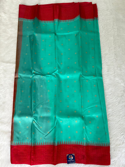 Gadwal Pattu Saree Sea Green colored saree complemented with a Rani Pink checks border - Sampradaya Designer Studio