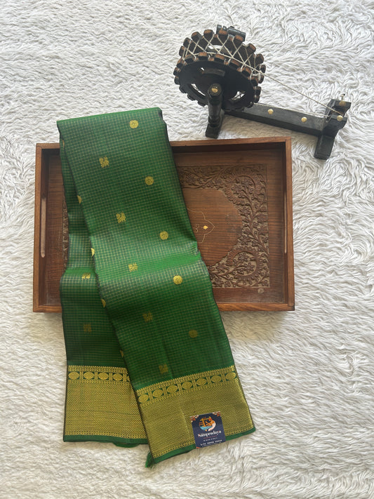 Pure Kanjivaram Silk Saree Dark Green Colored Complemented with a Gold Zari  Border. - Sampradaya Designer Studio