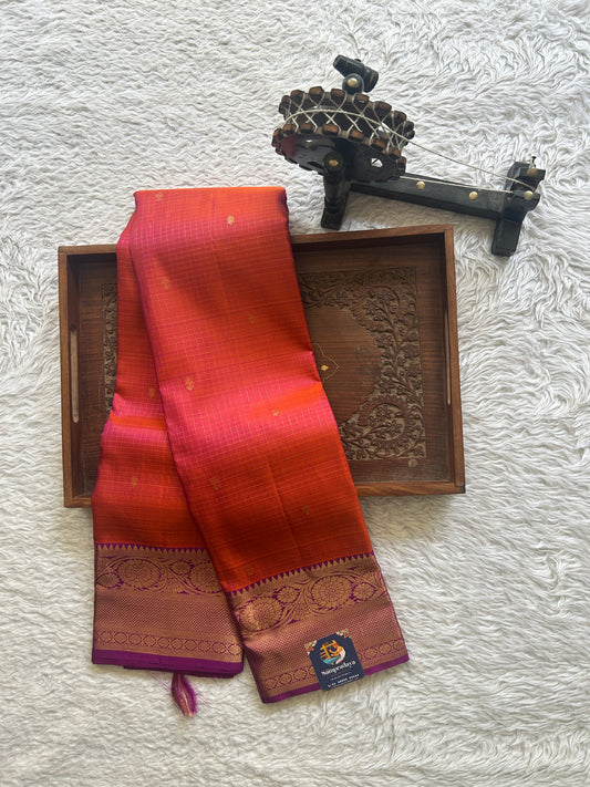 Pure Kanjivaram Silk Saree Rustic Orange Colored Complemented with Purple Color Border a Gold Zari Weaving. - Sampradaya Designer Studio