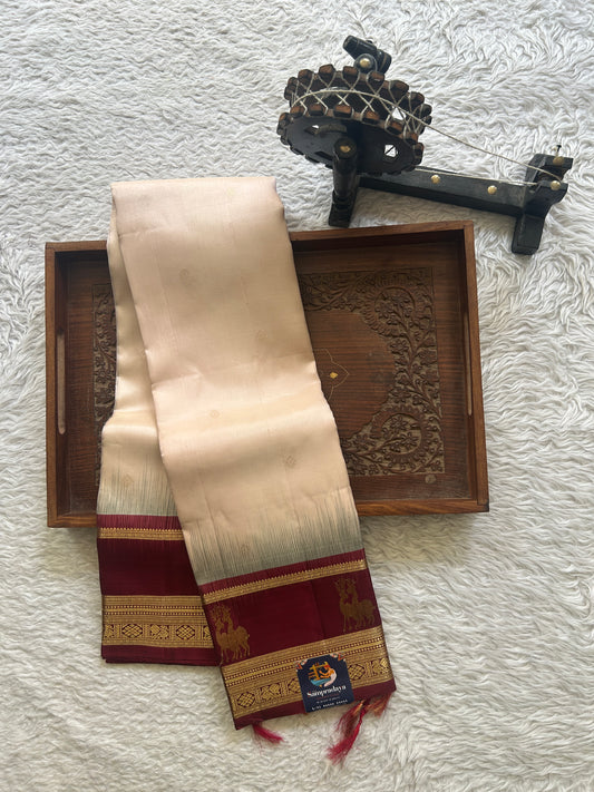 Pure Kanjivaram Silk Peach Colored Complemented with Maroon Color Gap Border a Gold Zari Weaving. - Sampradaya Designer Studio