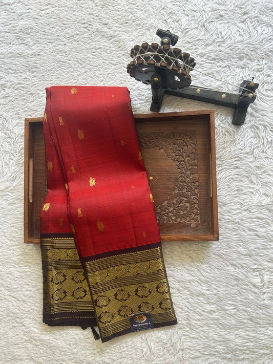Pure Kanjivaram Silk Saree Maroon Colored Complemented with Dark Brown Color Border a Gold Zari Weaving. - Sampradaya Designer Studio