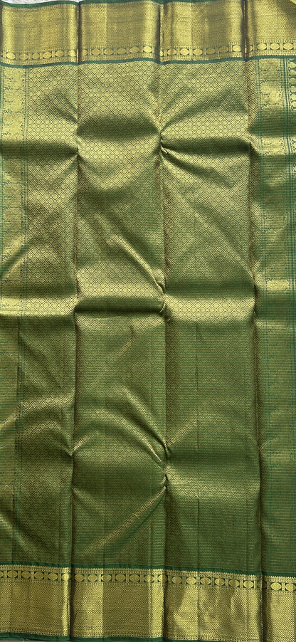 Pure Kanjivaram Silk Saree Dark Green Colored Complemented with a Gold Zari  Border. - Sampradaya Designer Studio