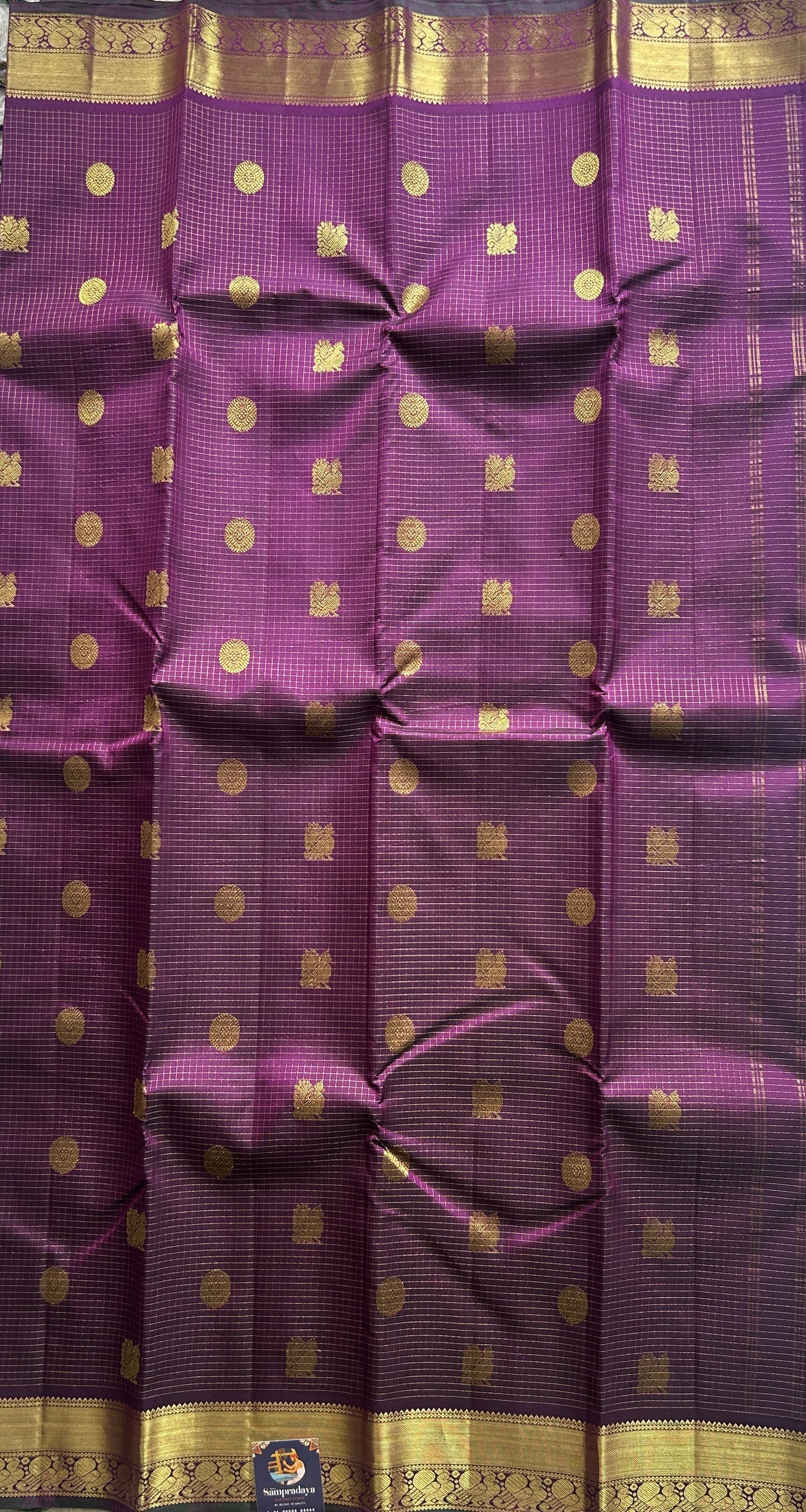 Pure Kanjivaram Silk Saree Purple Colored Complemented with a Gold Zari  Border. - Sampradaya Designer Studio