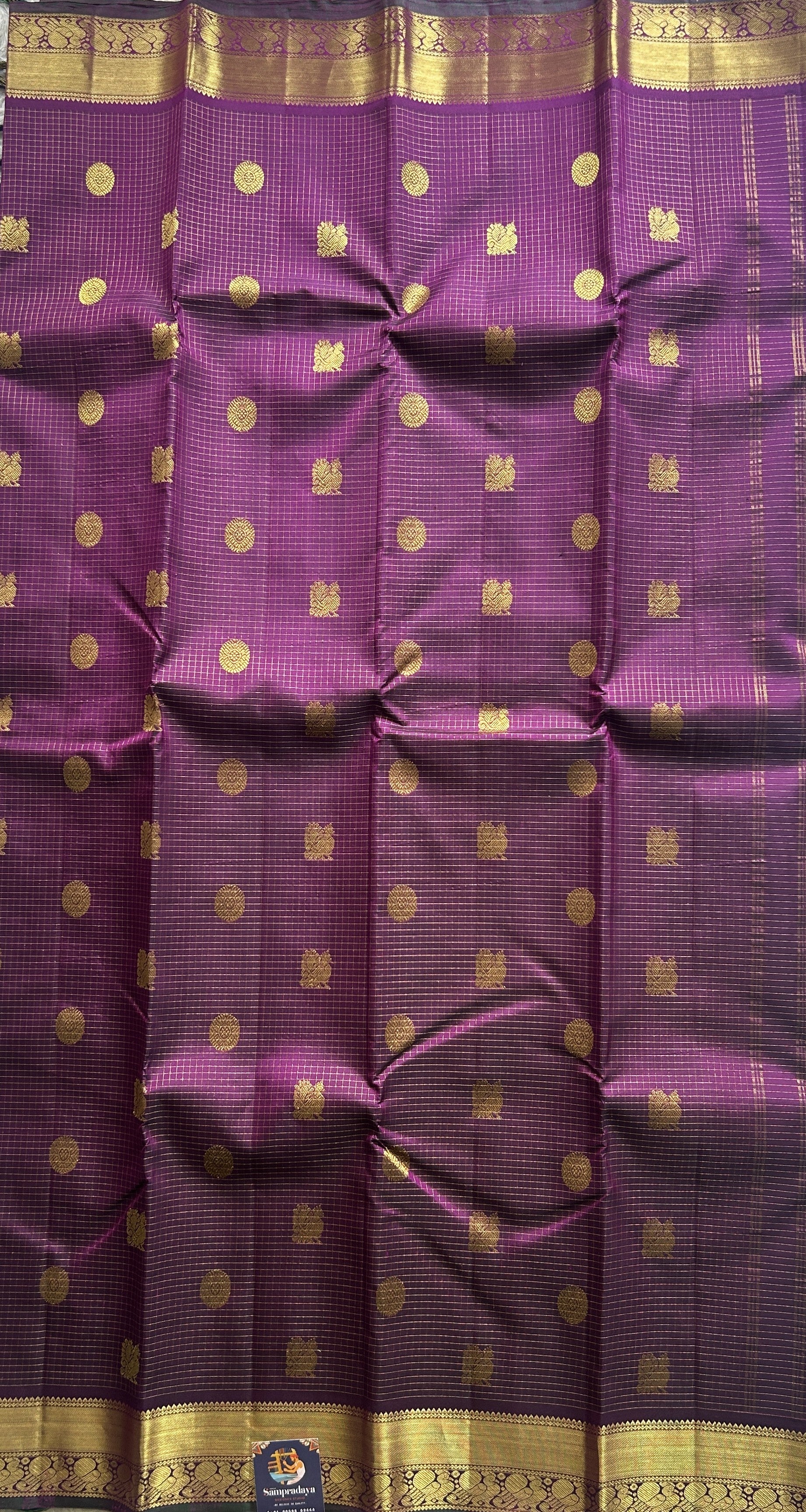 Pure Kanjivaram Silk Saree Purple Colored Complemented with a Gold Zari  Border. - Sampradaya Designer Studio