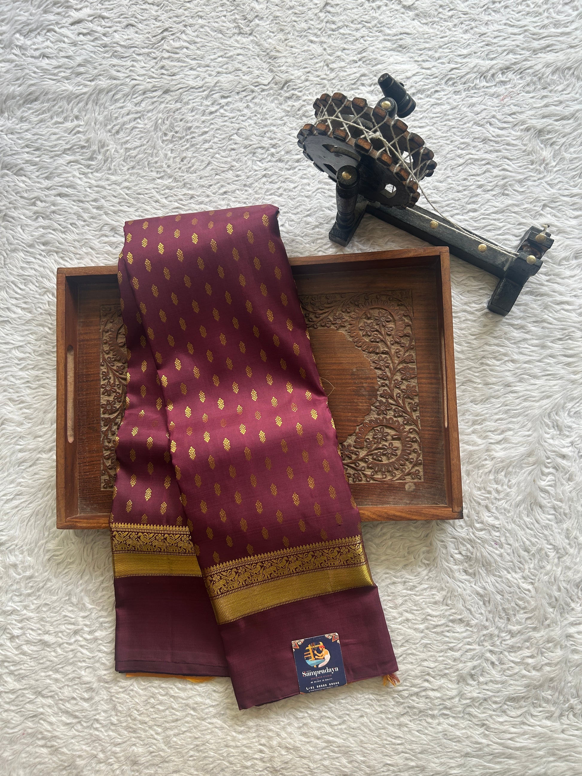 Pure Kanjivaram Silk Saree Wine Colored Complemented with a Gold Zari Gap Border. - Sampradaya Designer Studio