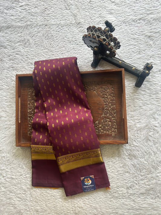 Pure Kanjivaram Silk Saree Wine Colored Complemented with a Gold Zari Gap Border. - Sampradaya Designer Studio