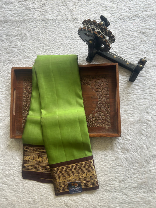 Pure Kanjivaram Silk Saree Sage Green Colored Complemented with Brown Color Border with a Gold Zari Weaving. - Sampradaya Designer Studio