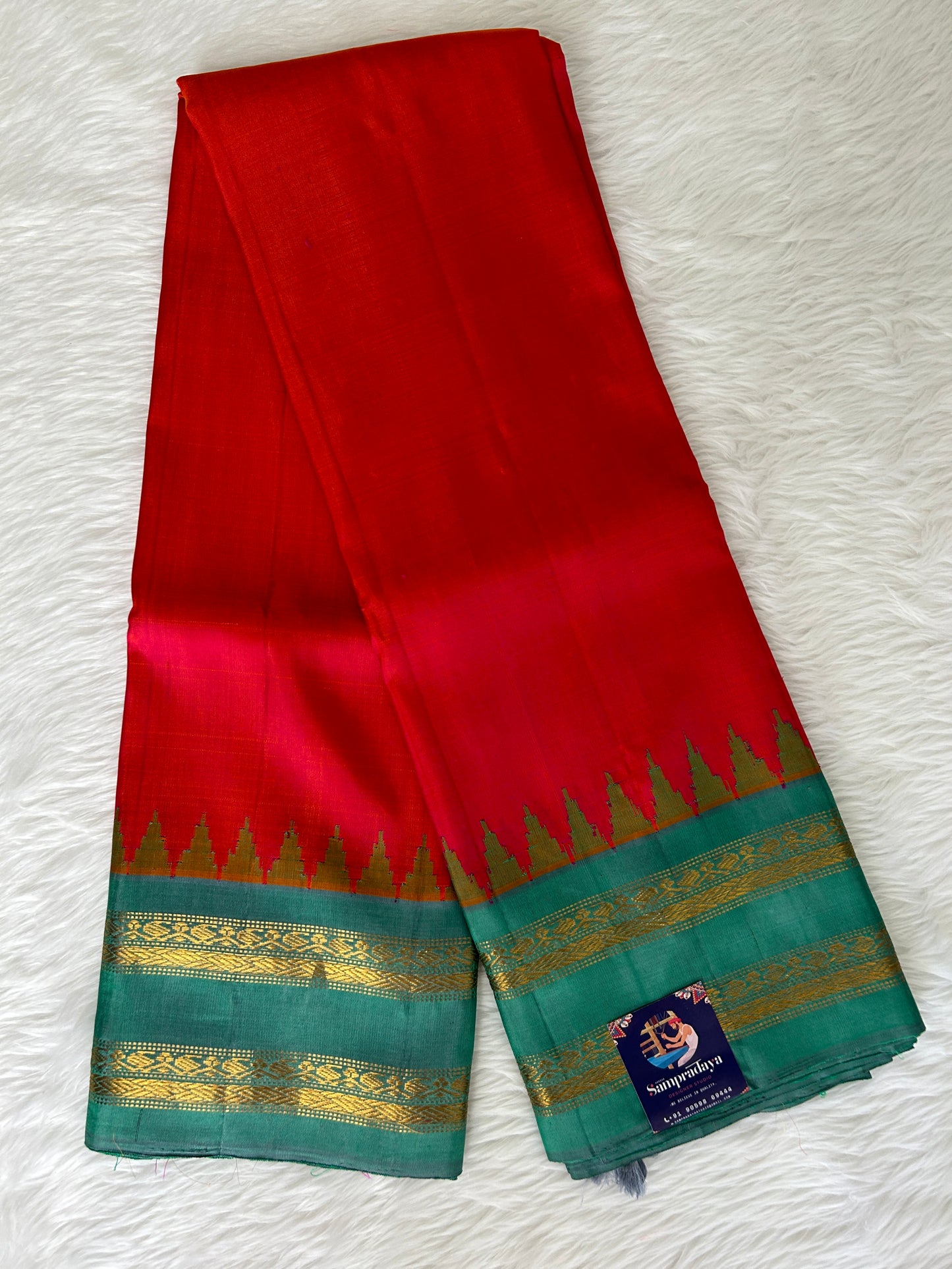 Gadwal Pattu Saree Pinkish Red Colored Saree Complemented With a Light Teal Green Gap Border - Sampradaya Designer Studio