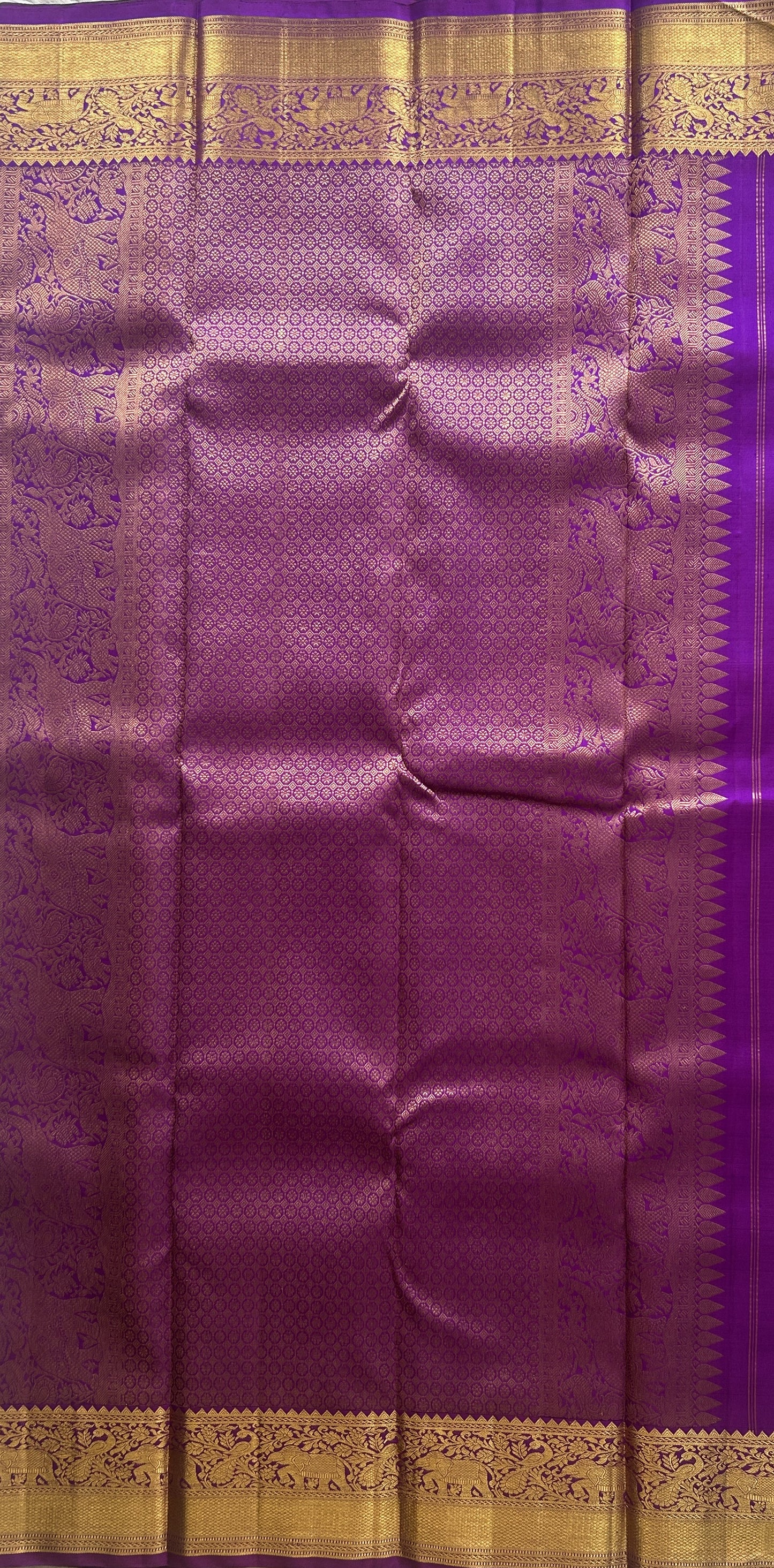 Pure Kanjivaram Silk Saree Purple Colored Complemented with a Gold Zari Gap Border. - Sampradaya Designer Studio