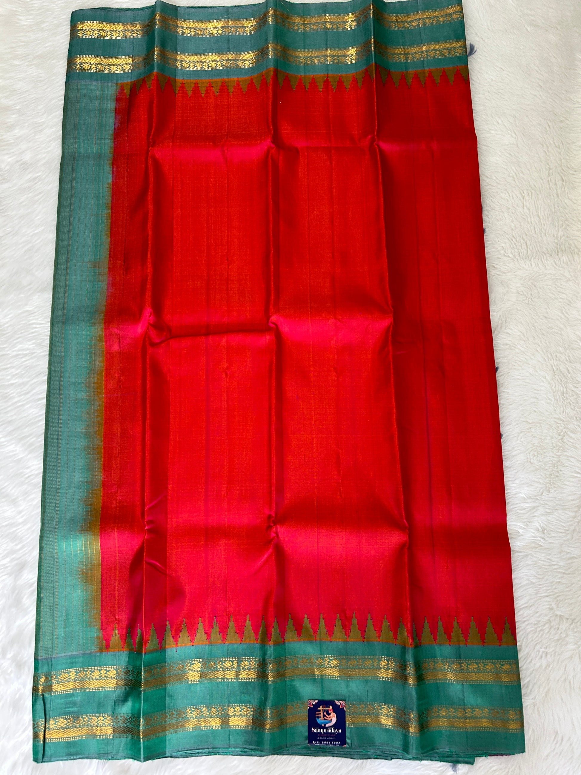 Gadwal Pattu Saree Pinkish Red Colored Saree Complemented With a Light Teal Green Gap Border - Sampradaya Designer Studio
