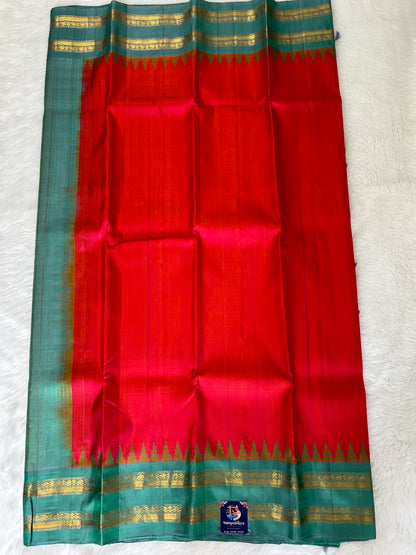 Gadwal Pattu Saree Pinkish Red Colored Saree Complemented With a Light Teal Green Gap Border - Sampradaya Designer Studio