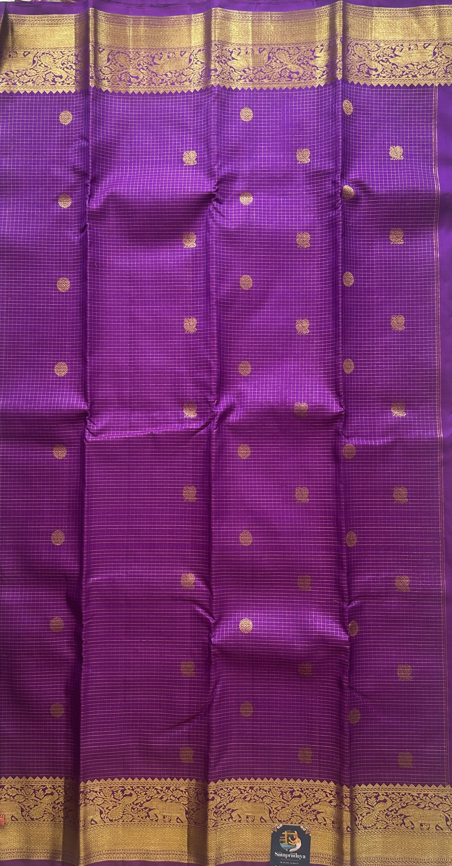 Pure Kanjivaram Silk Saree Purple Colored Complemented with a Gold Zari Gap Border. - Sampradaya Designer Studio