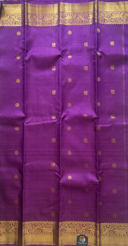 Pure Kanjivaram Silk Saree Purple Colored Complemented with a Gold Zari Gap Border. - Sampradaya Designer Studio