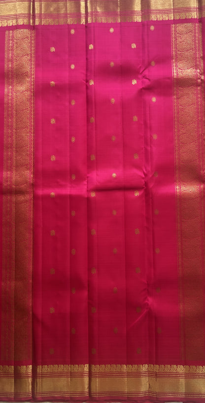 Pure Kanjivaram Silk Saree Pink Colored Complemented with a Gold Zari Gap Border. - Sampradaya Designer Studio