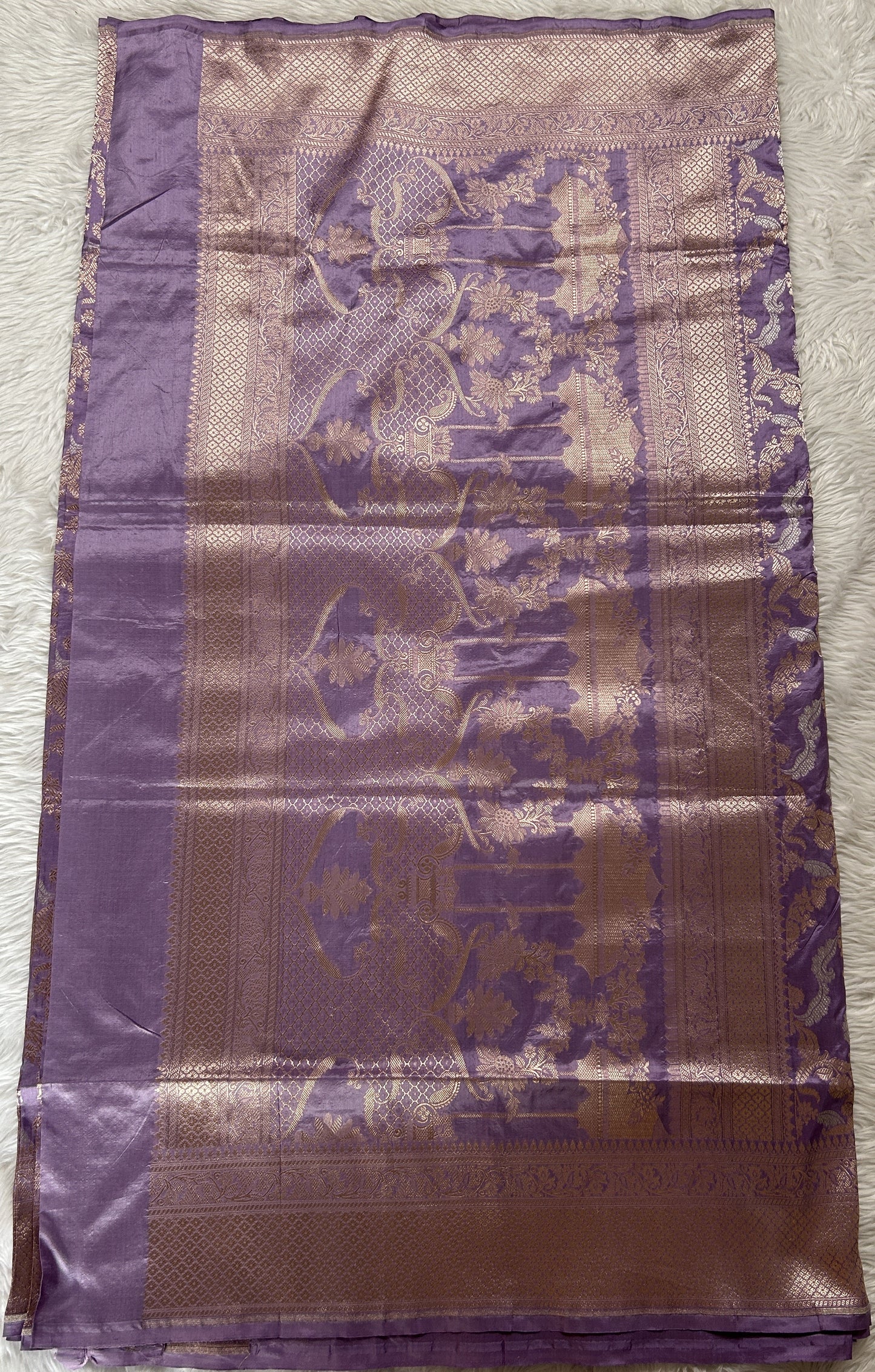 Banarasi Katan Silk Saree Lavender Colored Complemented with a Gold Zari border. - Sampradaya Designer Studio