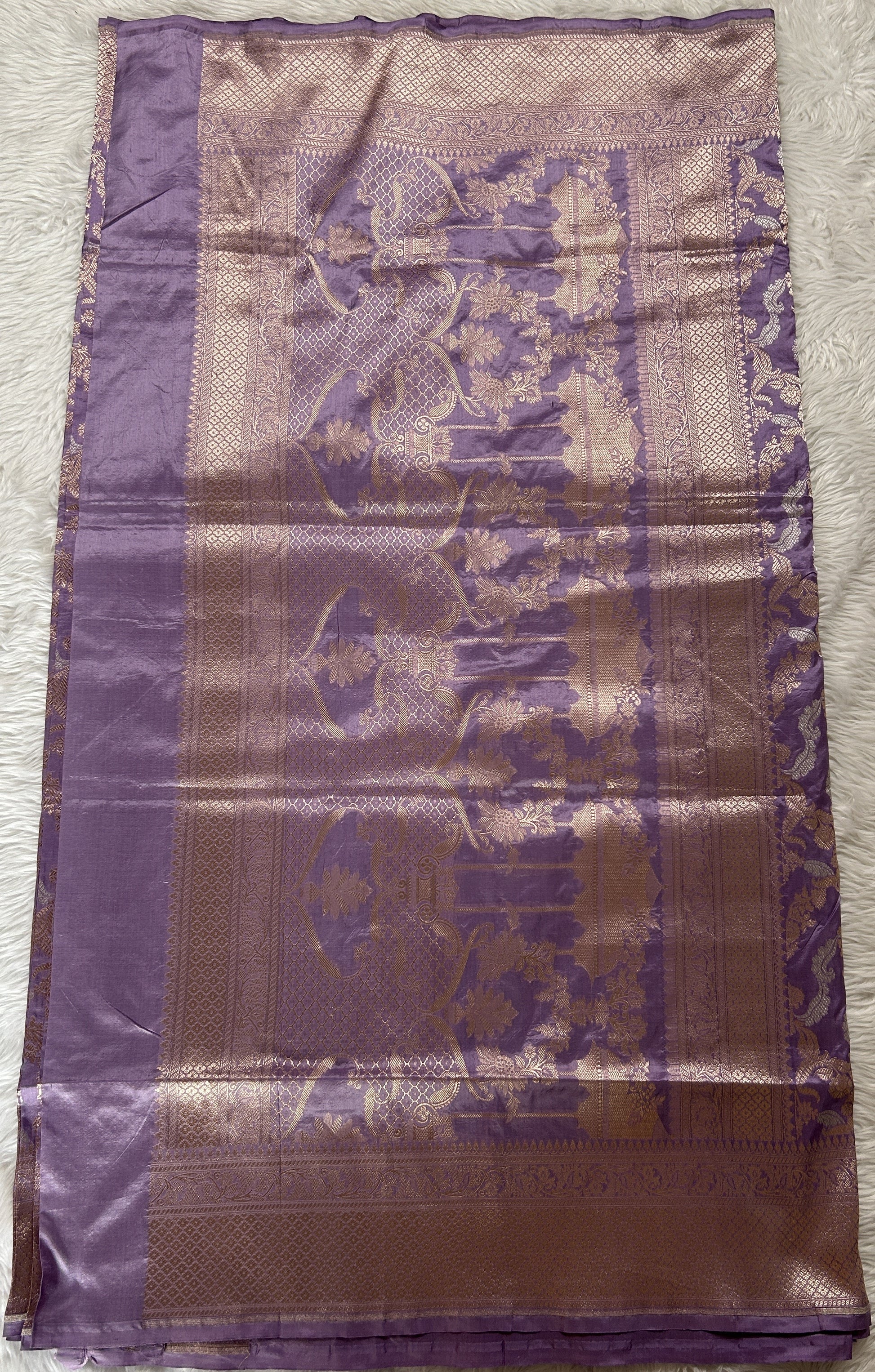 Banarasi Katan Silk Saree Lavender Colored Complemented with a Gold Zari border. - Sampradaya Designer Studio