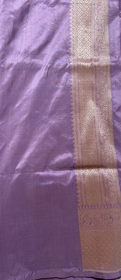Banarasi Katan Silk Saree Lavender Colored Complemented with a Gold Zari border. - Sampradaya Designer Studio