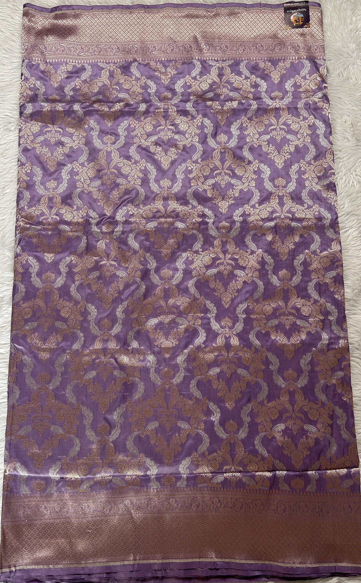 Banarasi Katan Silk Saree Lavender Colored Complemented with a Gold Zari border. - Sampradaya Designer Studio