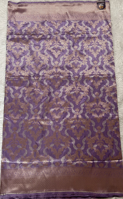 Banarasi Katan Silk Saree Lavender Colored Complemented with a Gold Zari border. - Sampradaya Designer Studio