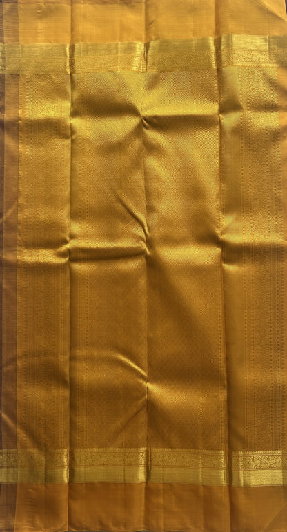 Pure Kanjivaram Silk Saree Wine Colored Complemented with a Gold Zari Gap Border. - Sampradaya Designer Studio