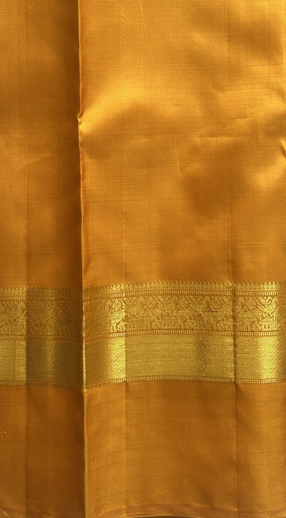 Pure Kanjivaram Silk Saree Wine Colored Complemented with a Gold Zari Gap Border. - Sampradaya Designer Studio