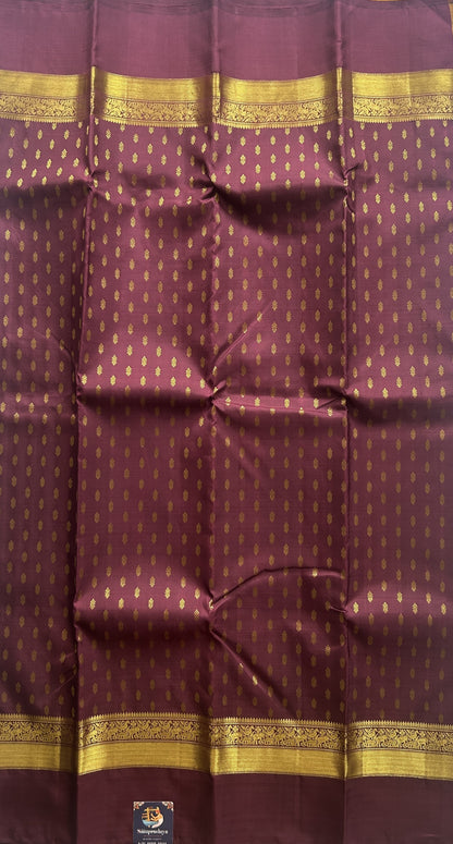 Pure Kanjivaram Silk Saree Wine Colored Complemented with a Gold Zari Gap Border. - Sampradaya Designer Studio