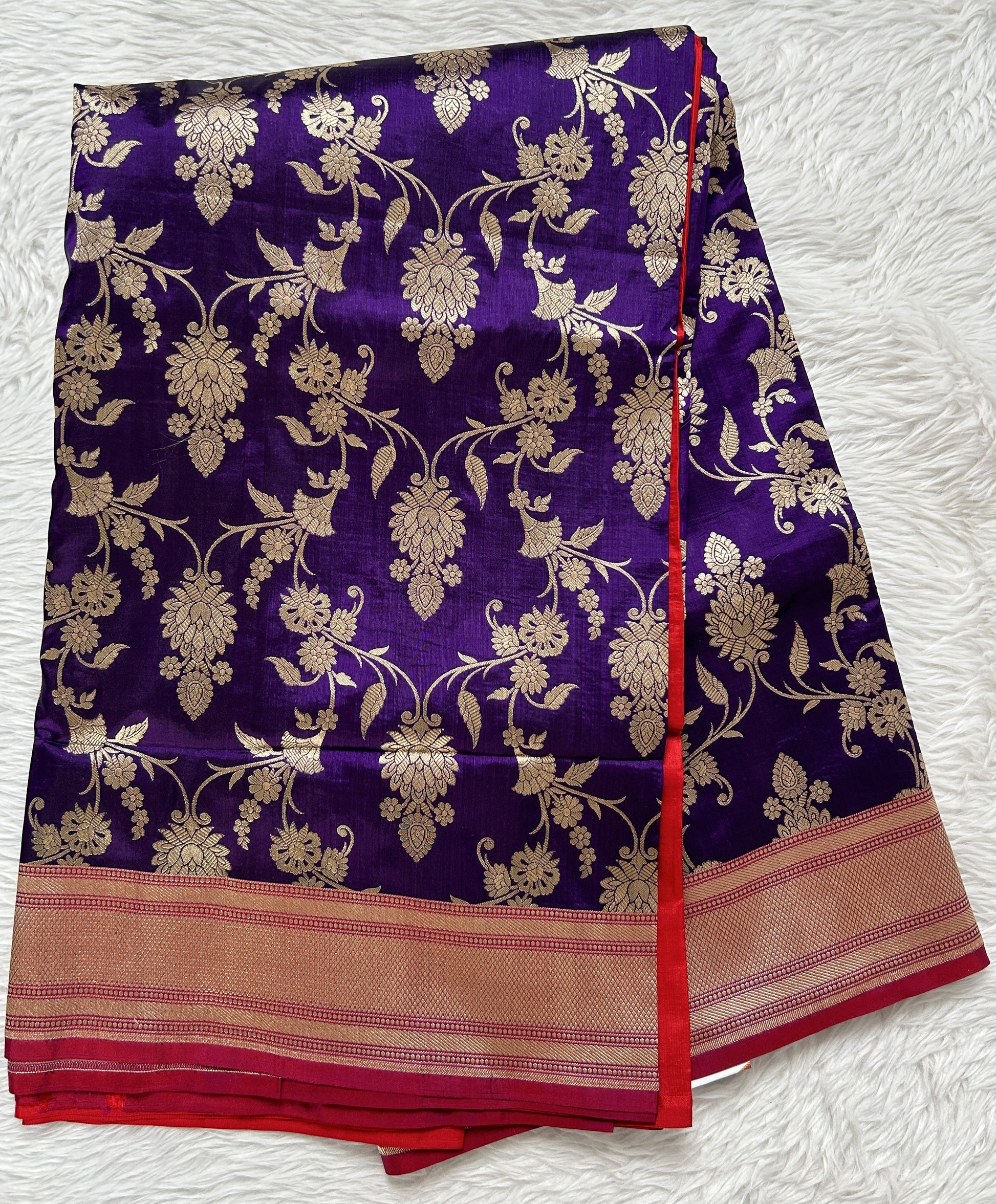 Banarasi Katan Silk Saree Violet Colored Complemented with a Gold Zari border. - Sampradaya Designer Studio