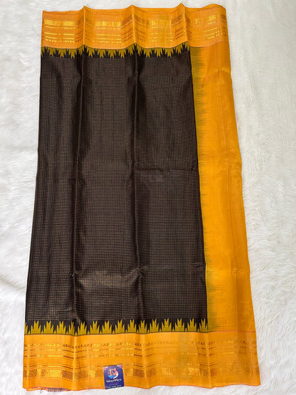 Gadwal Pattu Saree Brown Colored Complemented With a Mustard Yellow Gap Border - Sampradaya Designer Studio