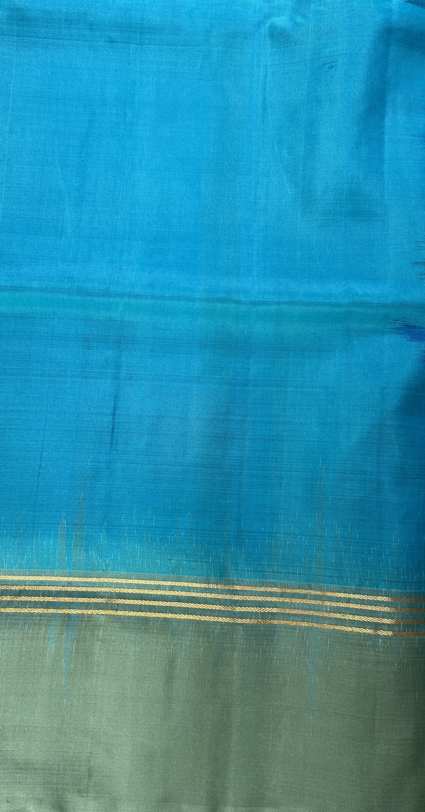 Kanjivaram Festive Soft Silk Saree Blue colored complemented with a Olive Green Colored Plain border. - Sampradaya Designer Studio