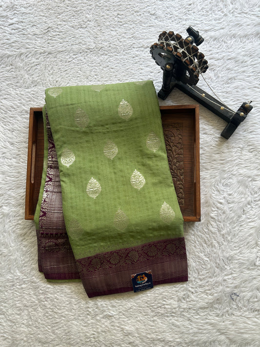 Semi Georgette Saree Parrot Green Colored Elegantly Paired with a Zari Border. - Sampradaya Designer Studio