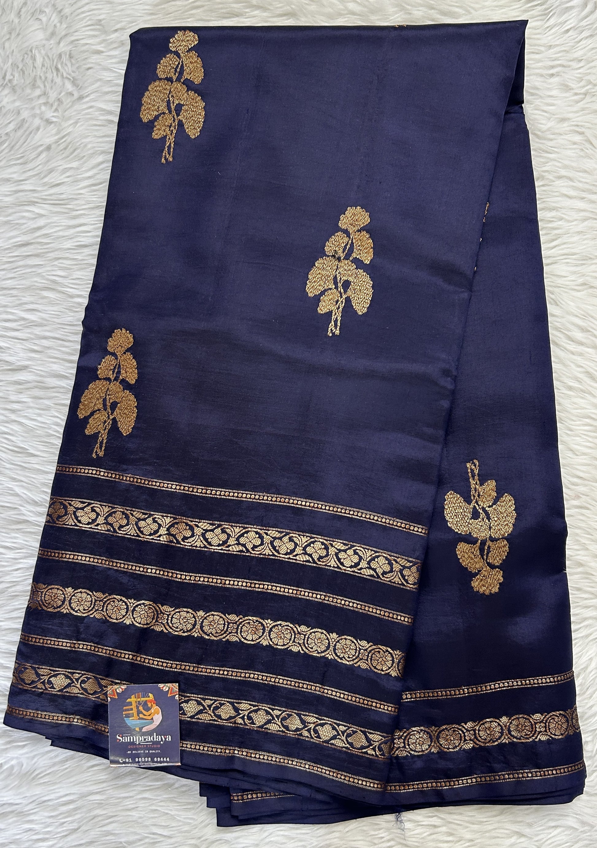 Raw Mango or Pooniya Silk Saree Ink Blue Colored Complemented With a Gap Border - Sampradaya Designer Studio