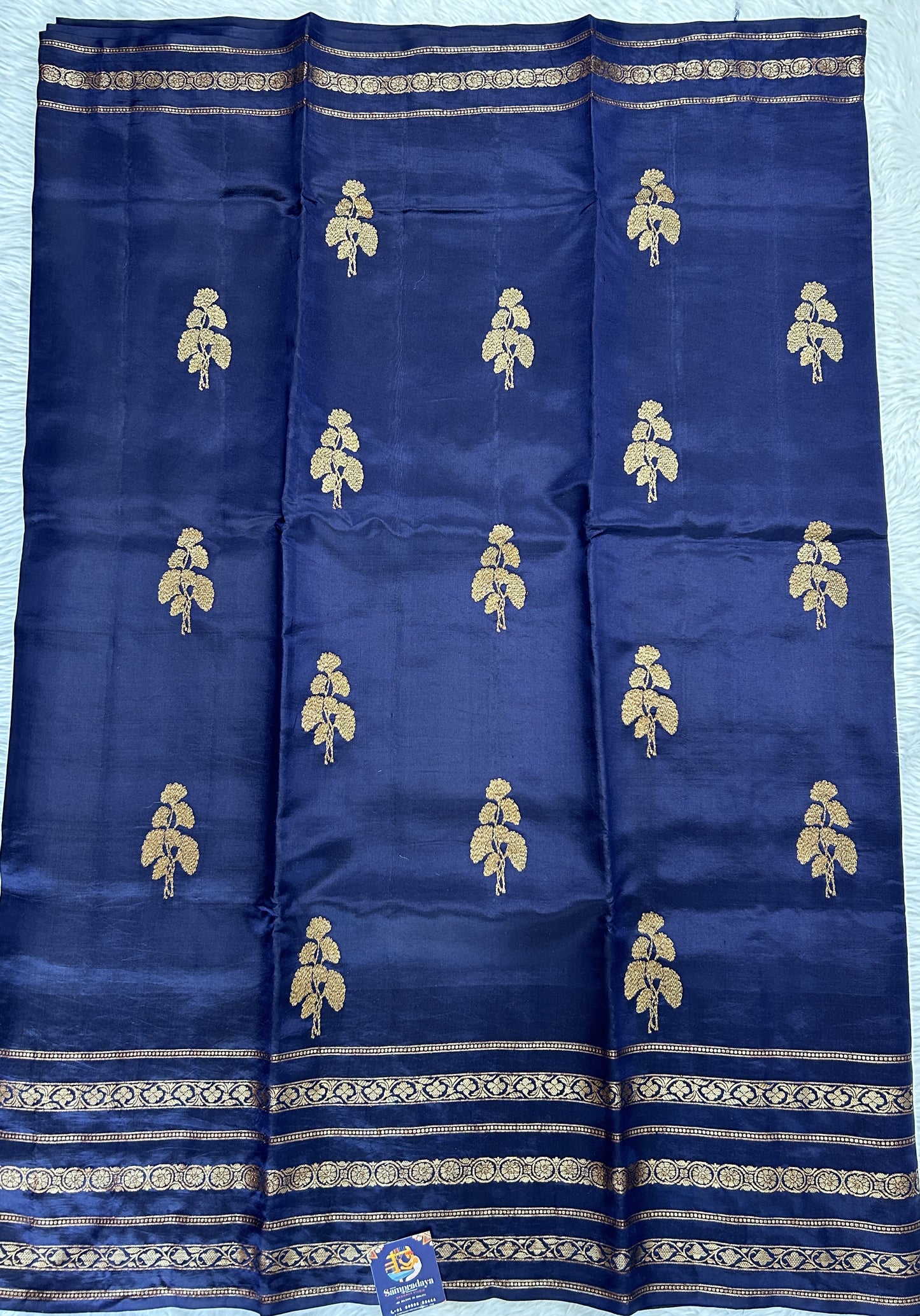 Raw Mango or Pooniya Silk Saree Ink Blue Colored Complemented With a Gap Border - Sampradaya Designer Studio
