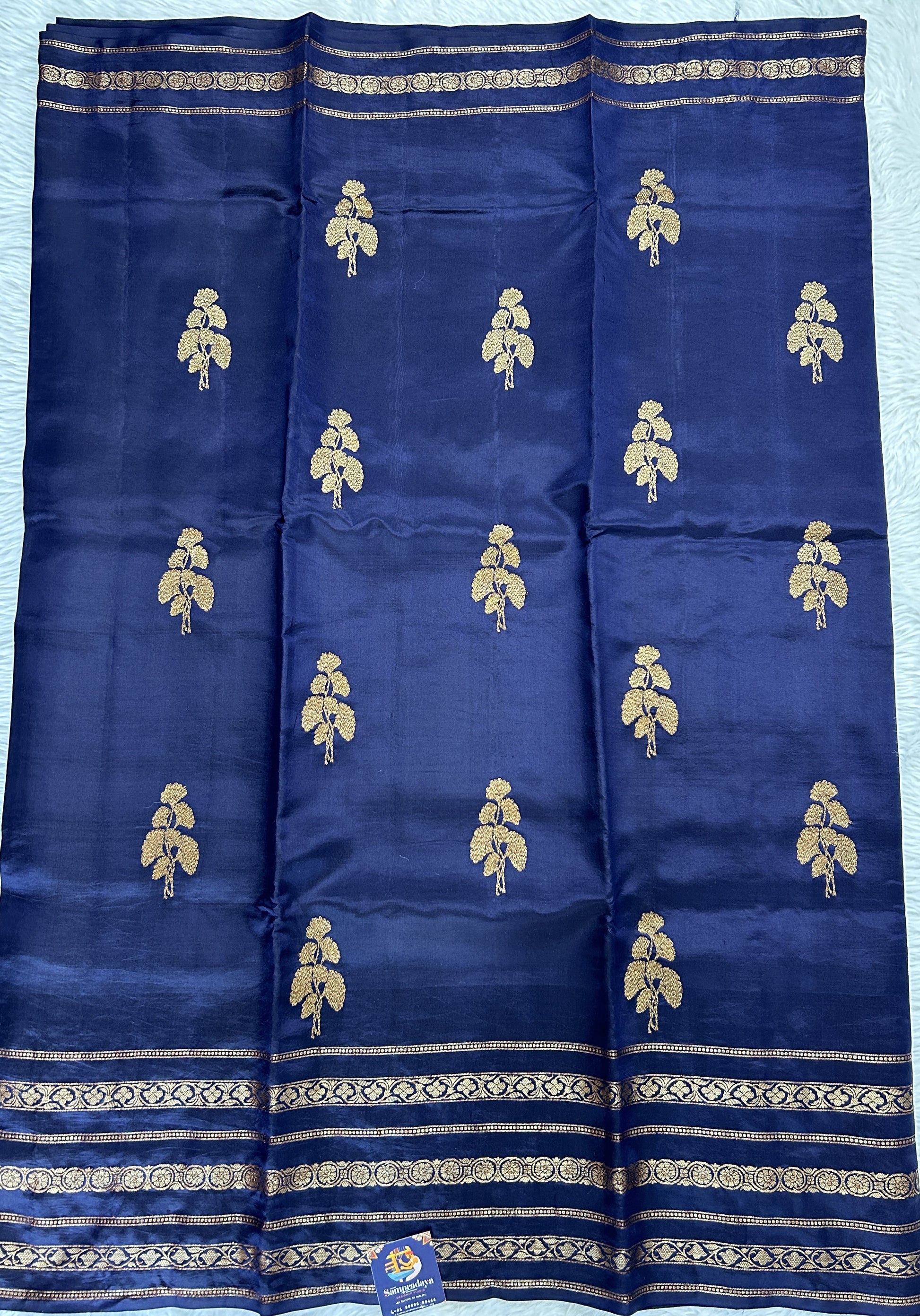 Raw Mango or Pooniya Silk Saree Ink Blue Colored Complemented With a Gap Border - Sampradaya Designer Studio