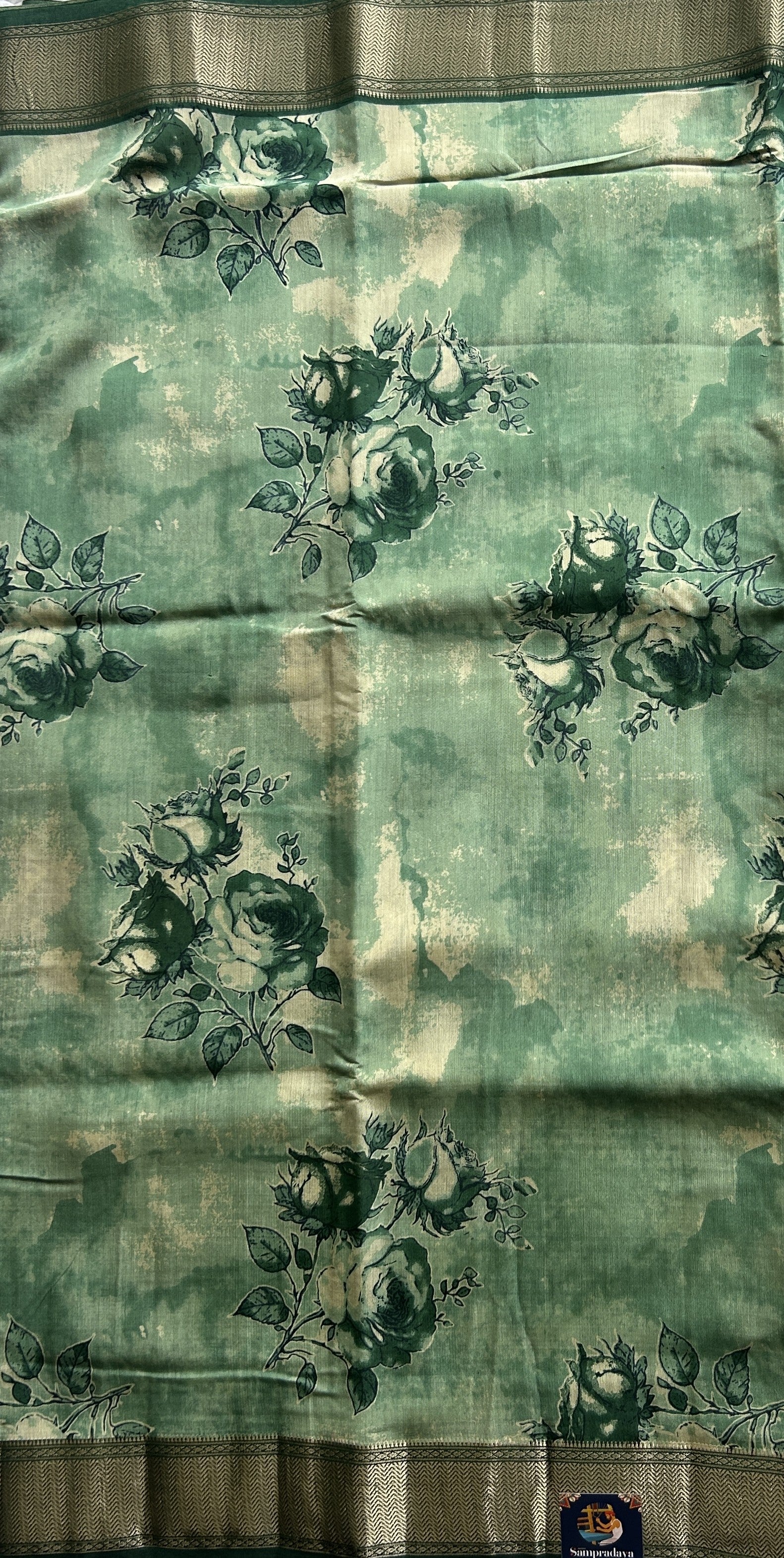 Dola Crepe Saree  Light Green Colored Elegantly Paired with a Zari Border. - Sampradaya Designer Studio