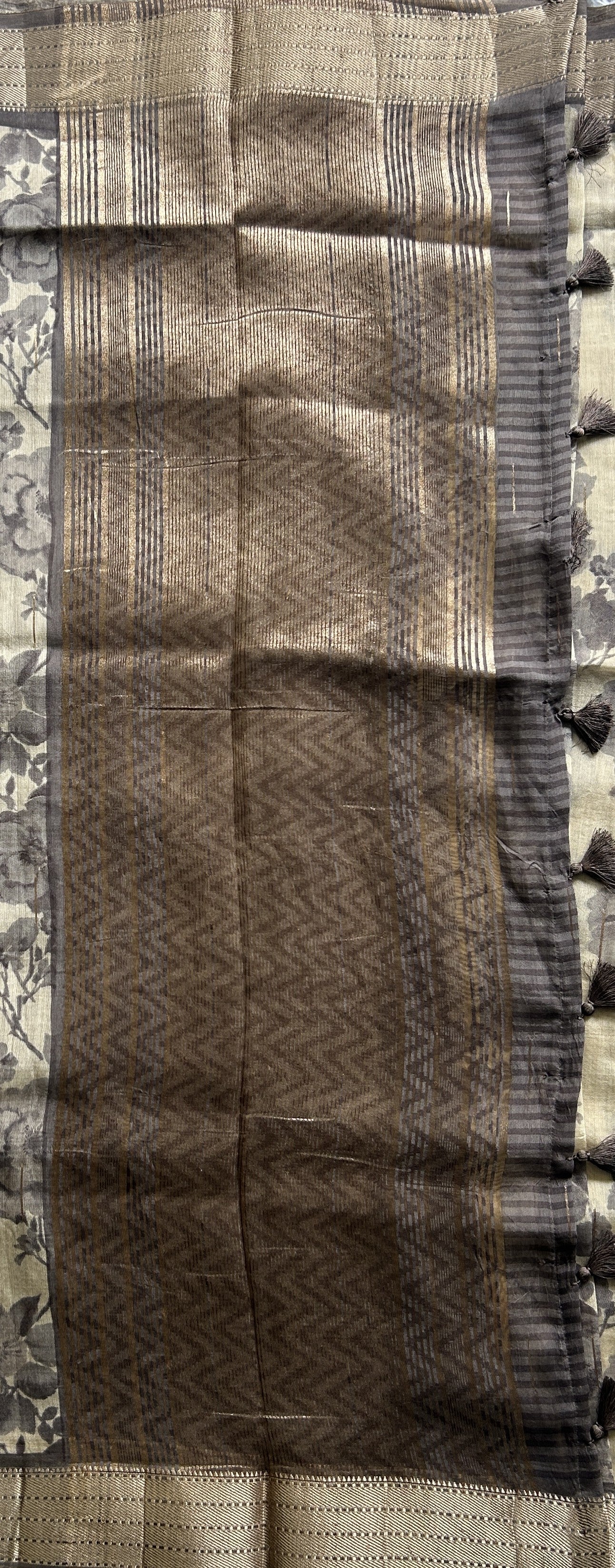 Dola Crepe Saree Beige Colored Elegantly Paired with a Gold Zari Border. - Sampradaya Designer Studio