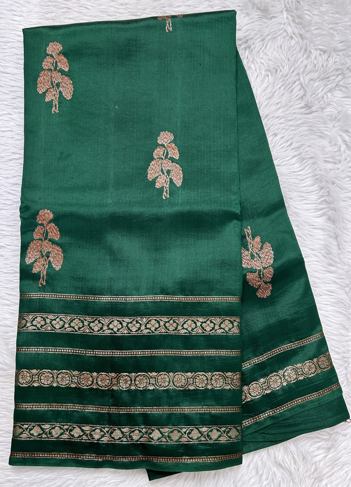 Raw Mango or Pooniya Silk Saree Bottle Green Colored Complemented With a Zari Gap Border - Sampradaya Designer Studio