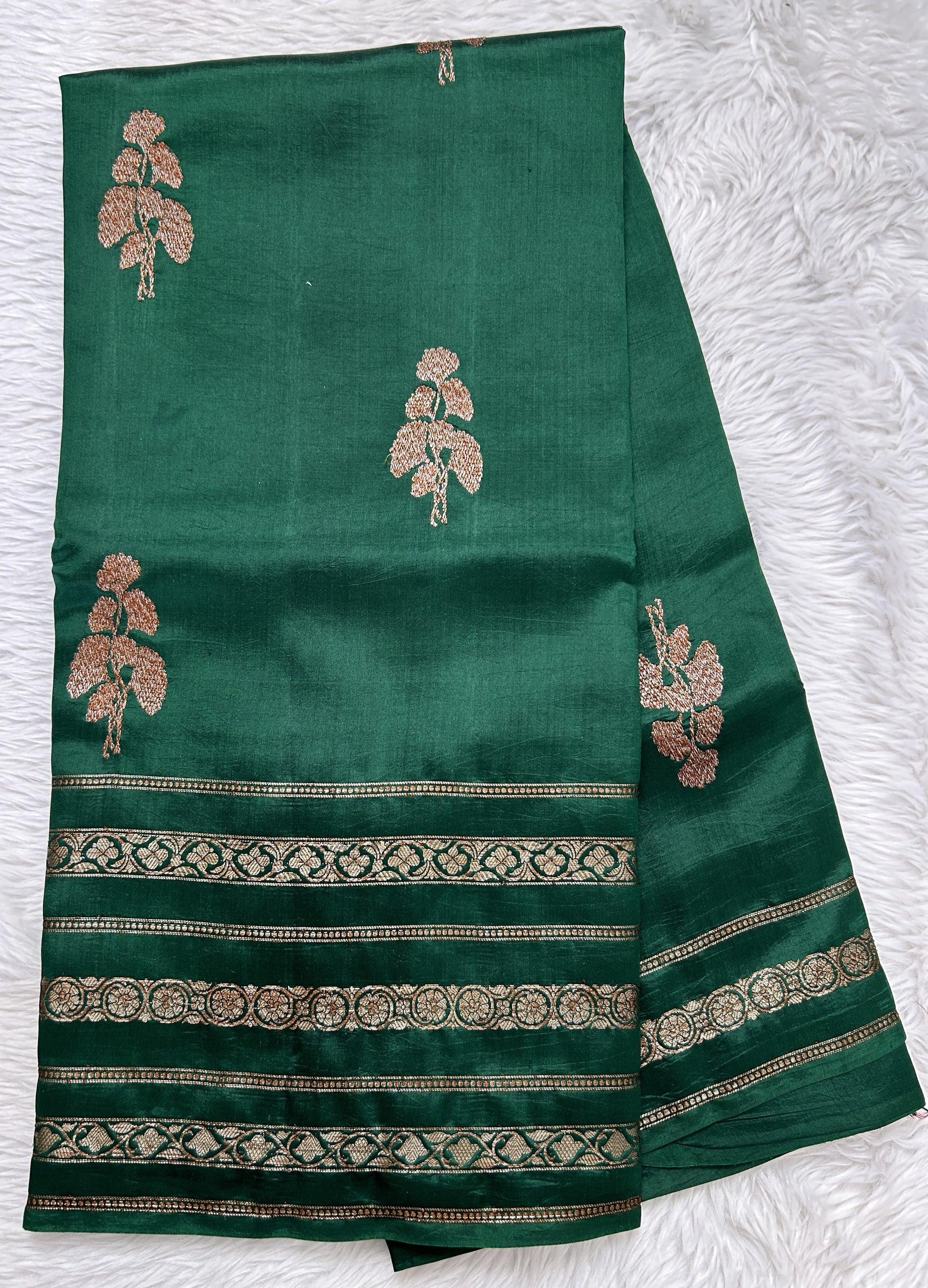 Raw Mango or Pooniya Silk Saree Bottle Green Colored Complemented With a Zari Gap Border - Sampradaya Designer Studio