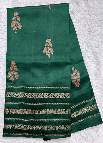 Raw Mango or Pooniya Silk Saree Bottle Green Colored Complemented With a Zari Gap Border - Sampradaya Designer Studio