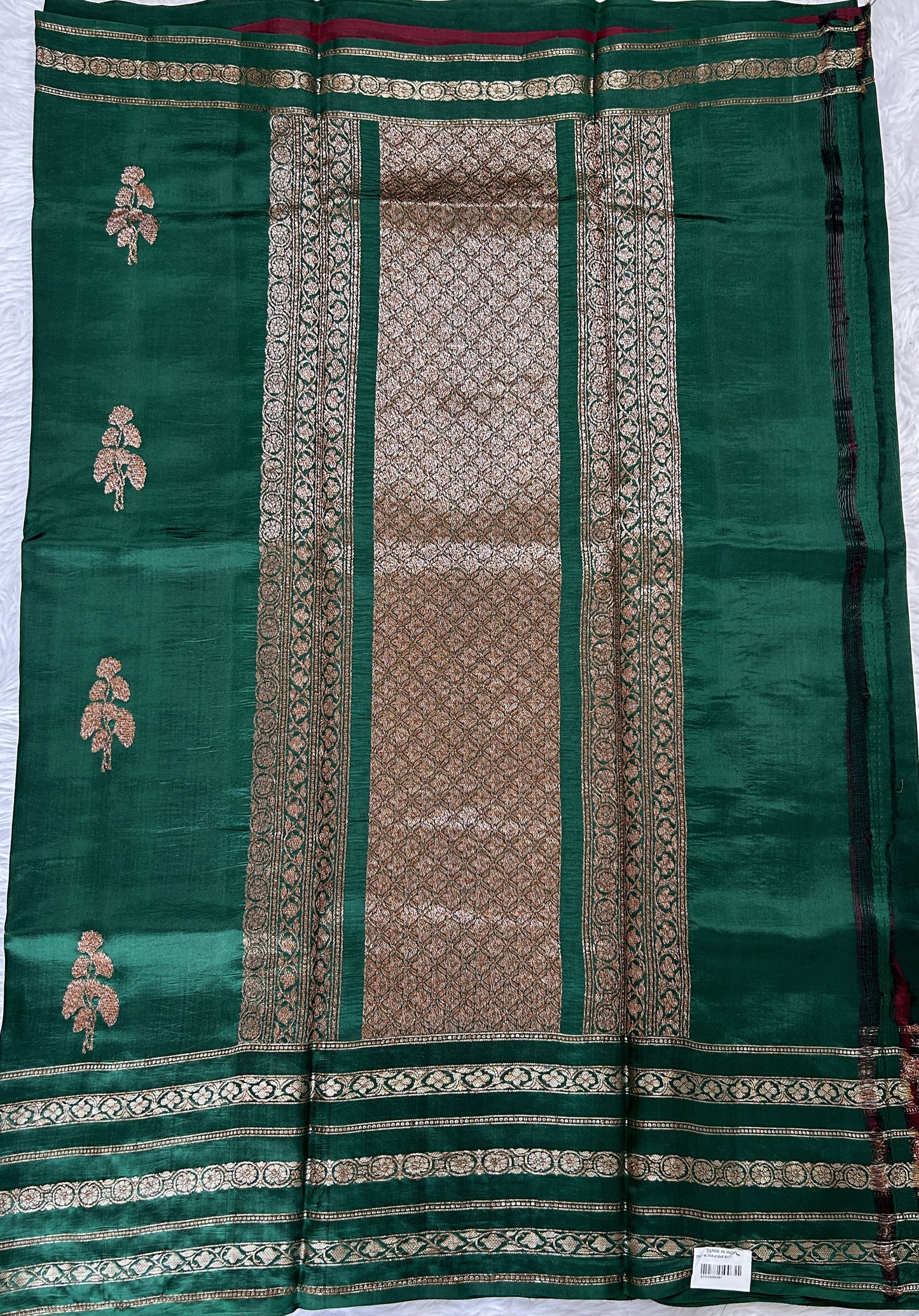 Raw Mango or Pooniya Silk Saree Bottle Green Colored Complemented With a Zari Gap Border - Sampradaya Designer Studio