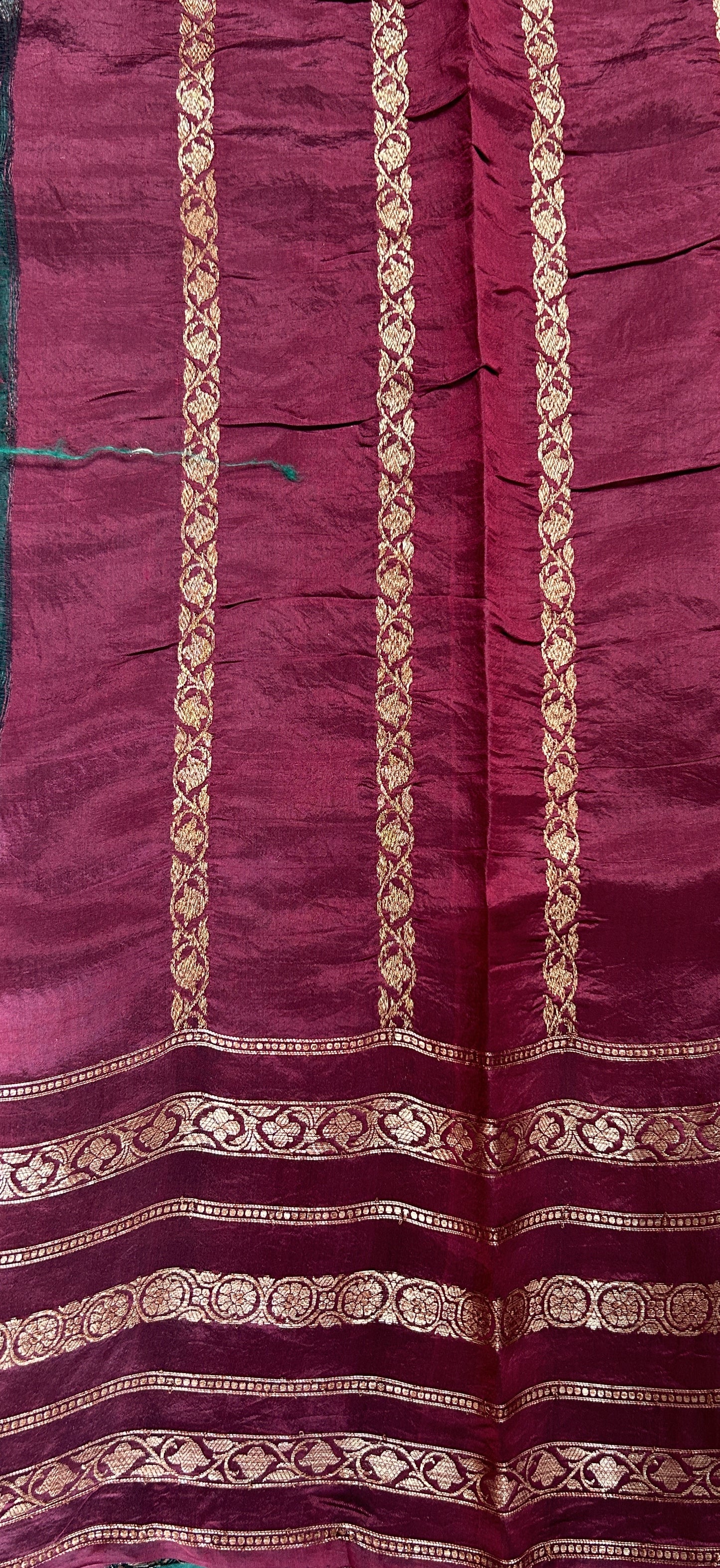 Raw Mango or Pooniya Silk Saree Bottle Green Colored Complemented With a Zari Gap Border - Sampradaya Designer Studio