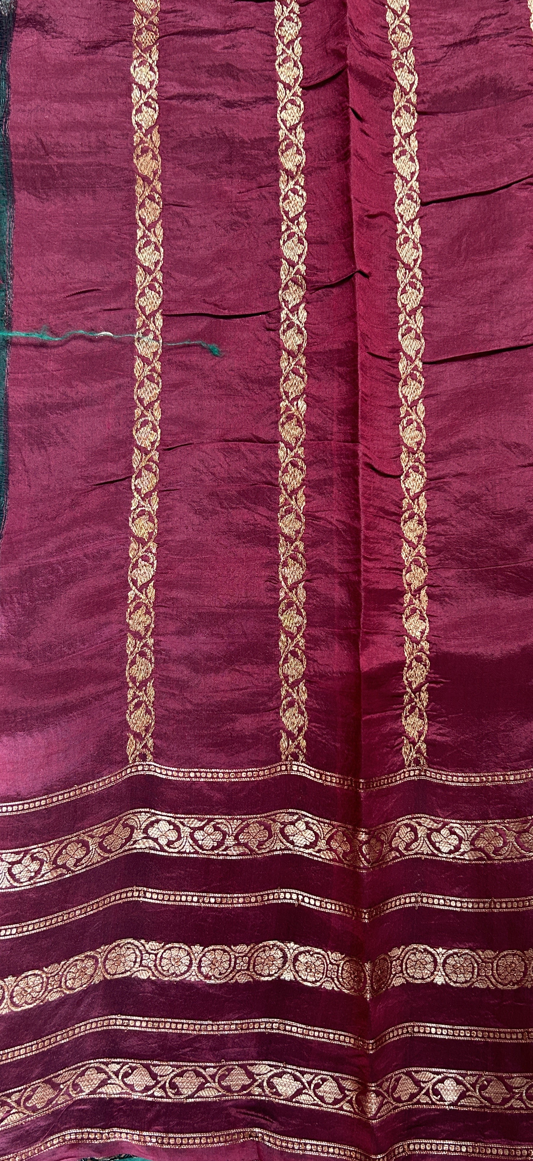 Raw Mango or Pooniya Silk Saree Bottle Green Colored Complemented With a Zari Gap Border - Sampradaya Designer Studio