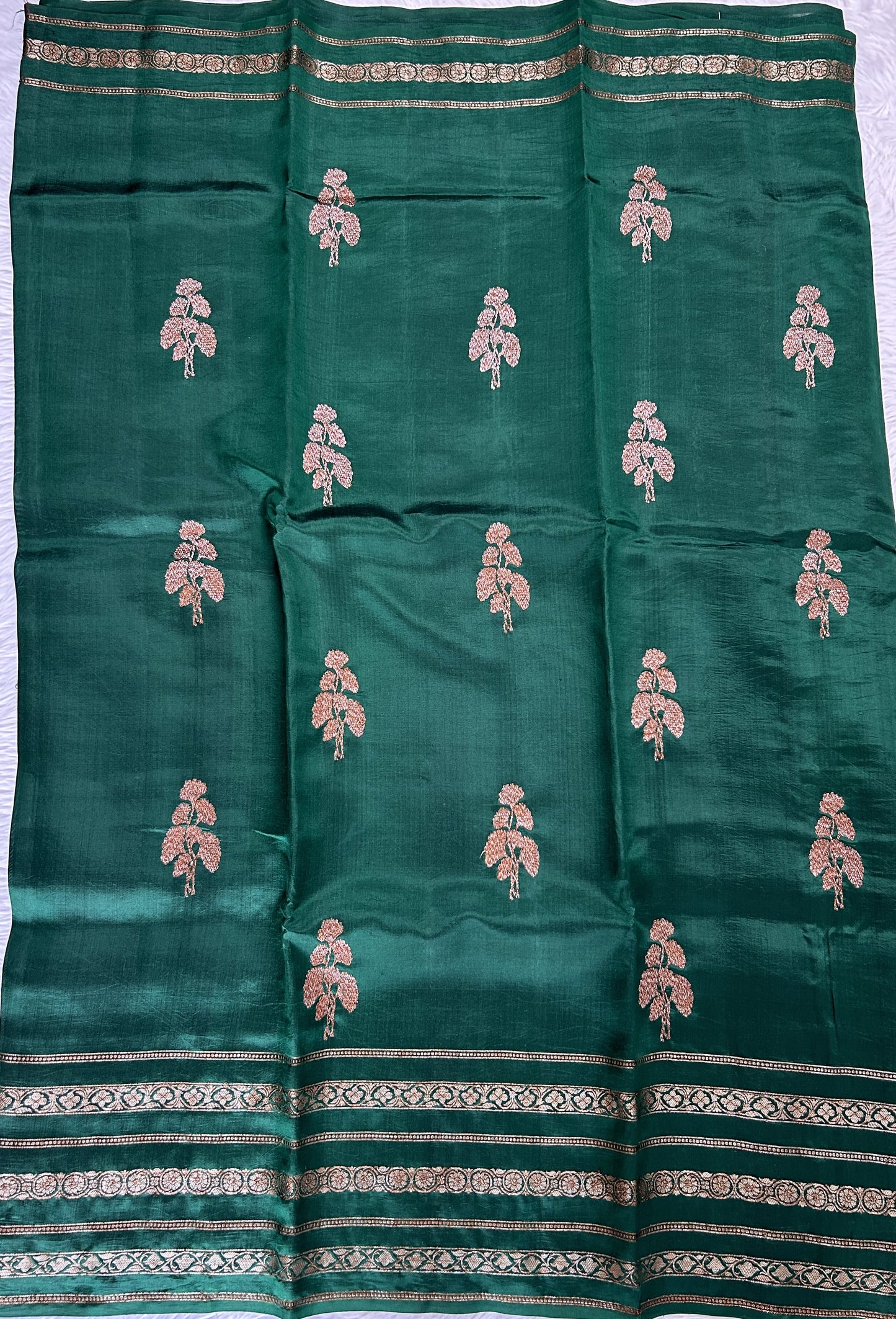 Raw Mango or Pooniya Silk Saree Bottle Green Colored Complemented With a Zari Gap Border - Sampradaya Designer Studio