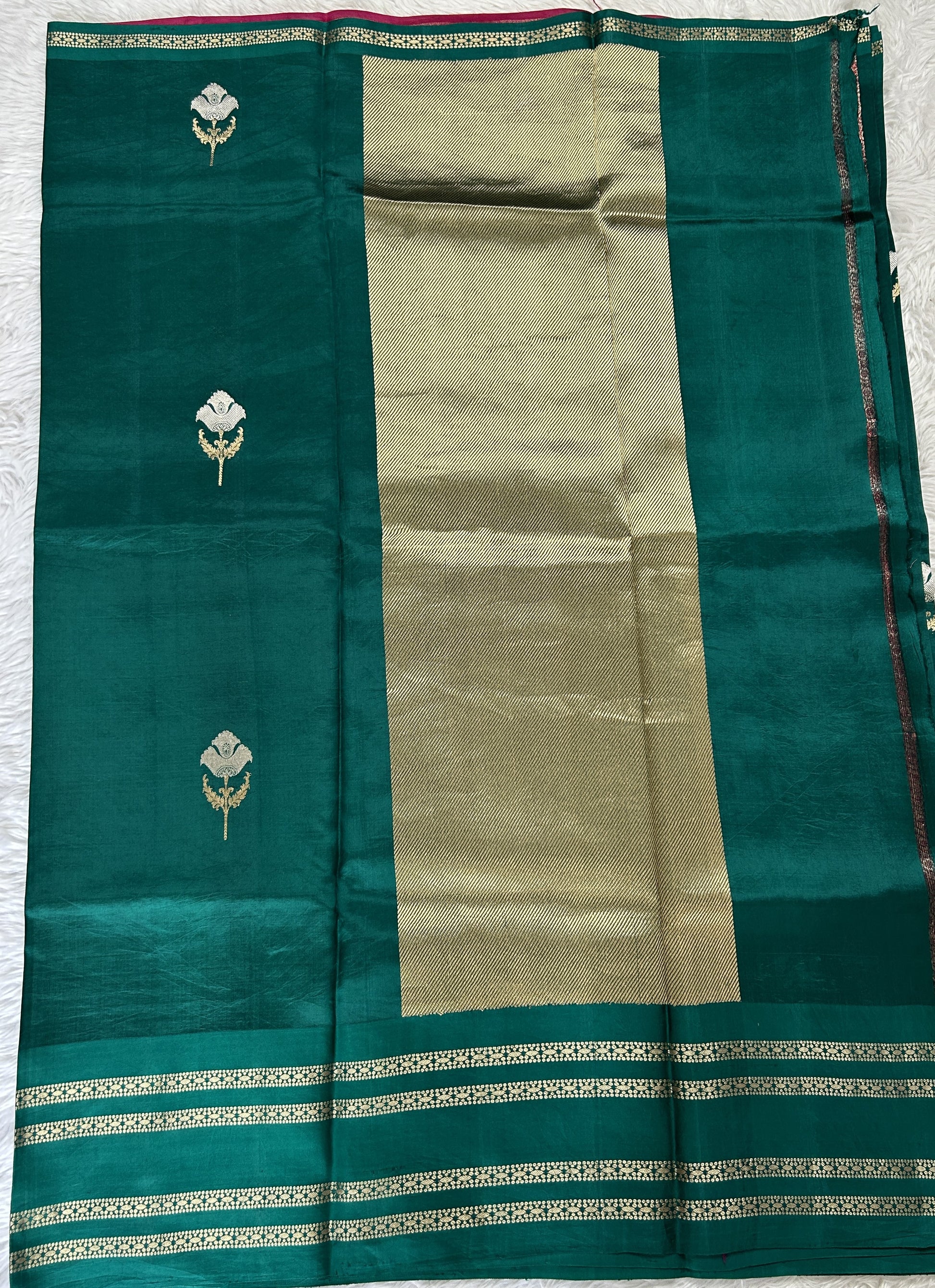 Raw Mango or Pooniya Silk Saree Green Colored Complemented With a Zari Gap Border - Sampradaya Designer Studio