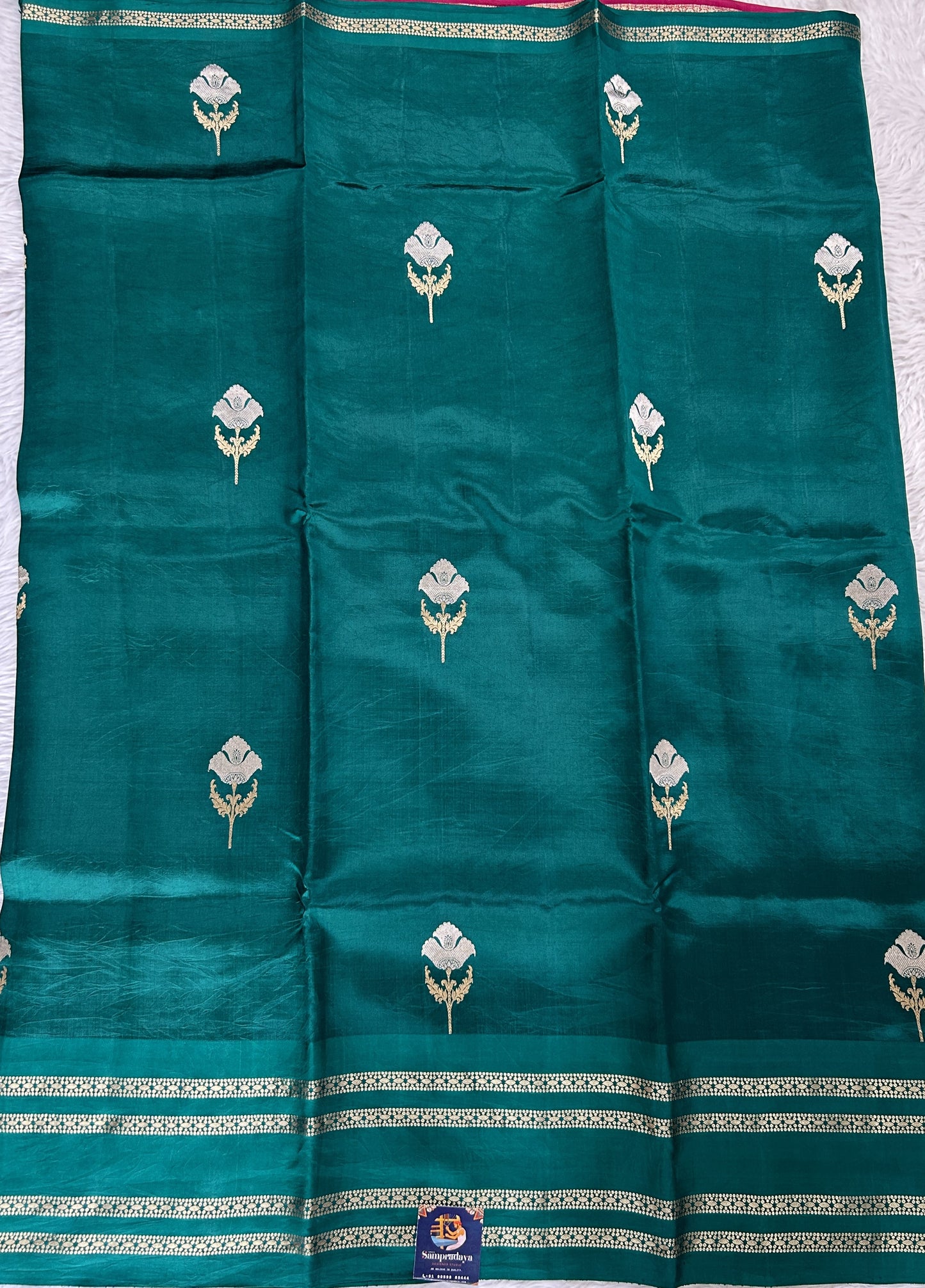 Raw Mango or Pooniya Silk Saree Green Colored Complemented With a Zari Gap Border - Sampradaya Designer Studio