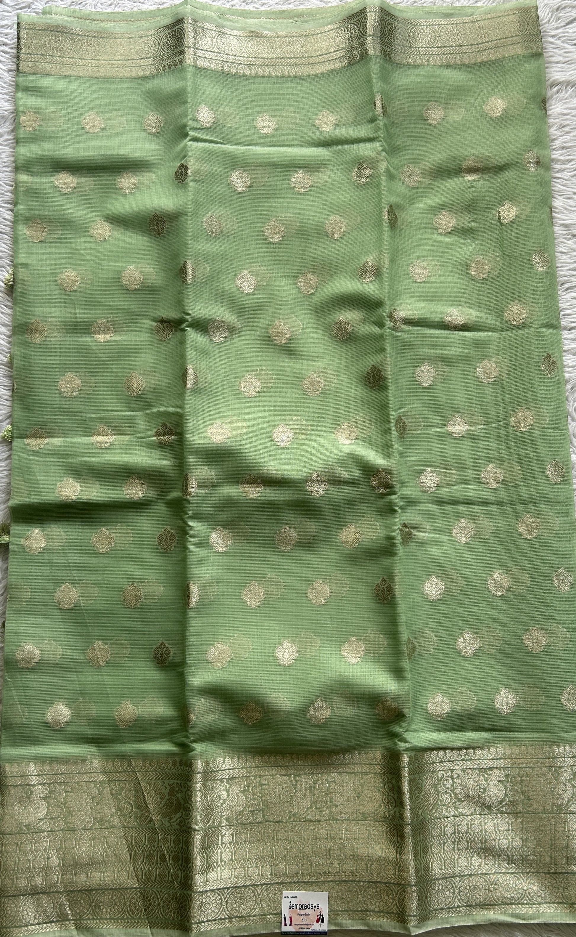 Silk kota Saree Light Green colored Complemented with a Zari Border. - Sampradaya Designer Studio