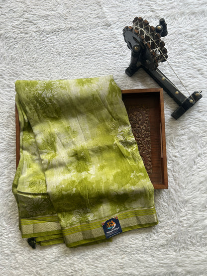 Dola Crepe Saree Leaf Green Colored Elegantly Paired with a Zari Border. - Sampradaya Designer Studio