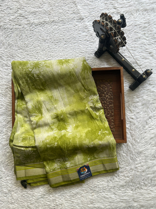 Dola Crepe Saree Leaf Green Colored Elegantly Paired with a Zari Border. - Sampradaya Designer Studio